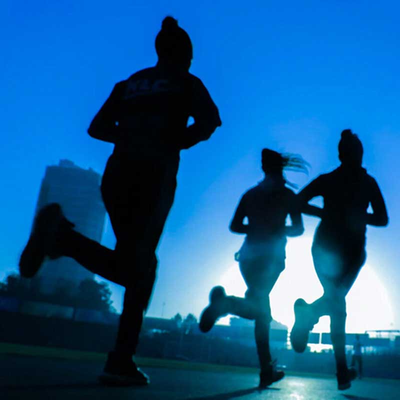 women running at twilight